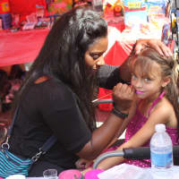 <p>A local girl gets her face painted at Yonkers Riverfest. </p>