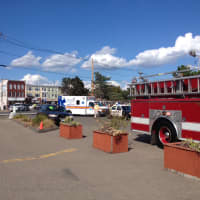 <p>Emergency vehicles gather at the scene of a ride malfunction at the Norwalk Oyster Festival. A total of 13 children were injured. </p>