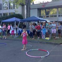 <p>Fans of Hello Yoga tried the hula hoop at the anniversary celebration.</p>