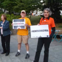 <p>Concerned Families of Westchester protest military action in Syria on the streets in Hastings on Monday.</p>