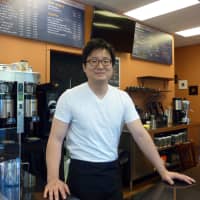 <p>Ridgefield resident Han Lee owns Coffee Story, a new coffee shop and cafe in Wilton.</p>