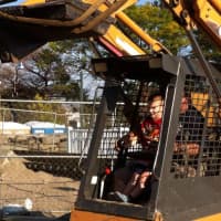 <p>Travis Rekos, the brother of Sandy Hook victim Jessica, helped to start digging the new playground at Fairfield&#x27;s Penfield Beach Friday morning. </p>