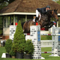 <p>McLain Ward and Cadence compete at the American Gold Cup.</p>