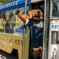 <p>Pace mascot T-Bone boards the special anniversary bus.
</p>