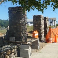 <p>Masons worked on repointing and repair of Dobbs Ferry&#x27;s White Church wall along Ashford Ave. this week.</p>