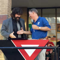 <p>Westport Weston Family Y CEO Rob Reeves is joined by wrestler Mick Foley during Wednesday&#x27;s 90th birthday celebration.</p>