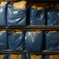 <p>The shelves at the Food Pantry packed with bags. Each bag contains enough food for 15 meals.</p>