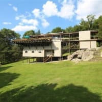 <p>This house at 246 Honey Hollow Road in Pound Ridge is open for viewing this Sunday.</p>