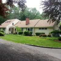 <p>This house at 25 Woodland Road in Pound Ridge is open for viewing this Sunday.</p>
