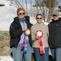 <p>Barbara Lindsay, left, stands with Callie Bauer and Robyn Musicant, who are also coaches in the Interscholastic Equestrian Association. </p>
