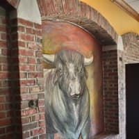 <p>Owner of T&amp;C Steakhouse, Patrick Jean, had a Fairfield resident draw a chalk drawing for the opening of his rebranded restaurant. </p>