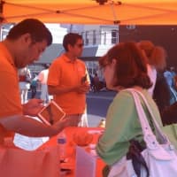 <p>Access Health CT employees set up informational booths at events around Connecticut to let residents know about the new health-care exchange, which opened Tuesday. </p>