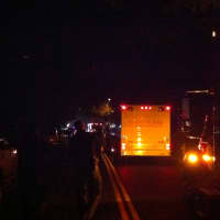 <p>Emergency vehicles respond to a house filled with unidentified chemicals on Bronson Road in Fairfield. </p>