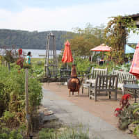 <p>Garden patio seating overlooking the Hudson River.</p>