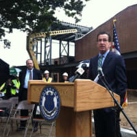 <p>Gov. Dannel P. Malloy speaks in front of J. M. Wright Technical High School Thursday. A ceremonial groundbreaking was held at the Stamford school that will reopen next year.</p>