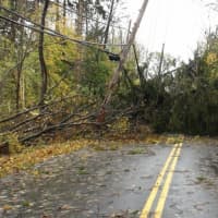 <p>Broad Street in Yorktown was blocked by downed trees and power lines after Hurricane Sandy.</p>