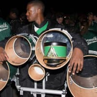 <p>A Norwalk High band member carries drums to prepare for Saturday&#x27;s show in Shelton.</p>
