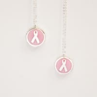 <p>Auburn Jewelry created breast cancer awareness pendants, with ten percent of the proceeds going to the American Cancer Society during the month of October.</p>
