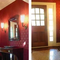 <p>The entrance foyer was furnished simply with basket-weave floor tiles, period lighting sconces, a dark wood pier table and mirror to complement the dark wood entrance door.</p>