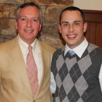 <p>Toyota of Stamford general manager Brandon Campbell, right, was named Family Center&#x27;s 2013 Family Champion. He received the award from Bob Arnold, president of Family Centers.</p>