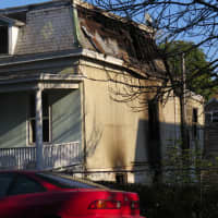 <p>Fire damage on the side of the South Bond Street home. </p>