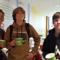 <p>From left, Middlebrook School students Henry Greene, Oliver Peacock and John Fortuna enjoy cookies and cream flavored frozen yogurt at Peachwave in Wilton.</p>