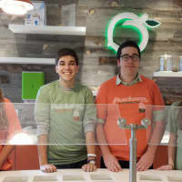 <p>From left, Kelly Sandberg, Nicholas Dehn, Eamon Flaherty and Casey Cunningham are some of the Wilton High School students employed at the new Peachwave Frozen Yogurt shop.</p>