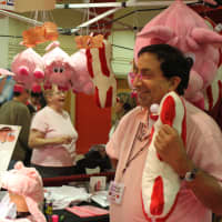 <p>Executive Chef Lawerence Rosenberg of Bacon Bites sells chocolate covered bacon and merchandise.</p>
