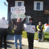 <p>Ossining Boat and Canoe Club members protest the study to see if a restaurant should go in the club&#x27;s building.</p>