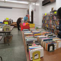 <p>Patrons perused the variety of books at the Mount Vernon Public Library.</p>
