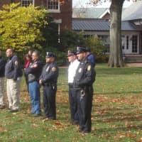 <p>Police officers and veterans gathered on the Rye Village Green to watch the ceremony honoring Veterans Day.</p>