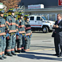 <p>Mayor Mike Spano and Fire Commissioner Robert Sweeney speak to probationary firefighters before demonstration.</p>