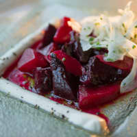 <p>The Beet and Pear Salad consists of pear-infused beets, citrus Yuzu yogurt, shaved fennel and parsley oil ($13). </p>