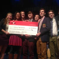 <p>Students pose with the $100,000 check from State Farm. Suggestion boxes will be set up to gather ideas on how to spend the money. </p>