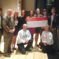 <p>Mayor Mark Boughton and State Farm agents Tom Huse and Maria Ordonez pose with the students and the big check on the Danbury High auditorium stage. </p>