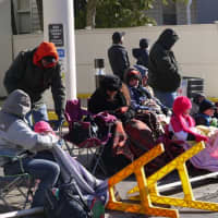 <p>This group from Hamden came bundled in four layers of clothing to watch the parade. </p>
