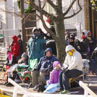 <p>All along the parade route, people were bundled in their warmest clothes to ward off the chill and wind to watch the Stamford parade. </p>