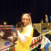 <p>Katie Emerson of Pets Alive in Elmsford was offering up pets for adoption.</p>