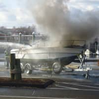 <p>A boat caught fire Friday as it was pulled from the water on its trailer at the public boat launch in East Norwalk. </p>
