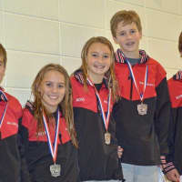 <p>Whirlwind&#x27;s 12-13 year-old divers take the medal stand. Left to right are Kevin Bradley, Anne Farley, Claire Ross, Owen Stevens and Wiley Schmidt.</p>