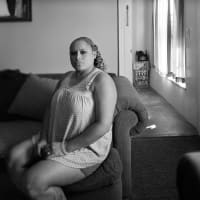 <p>Shayok Mukhopadhyay&#x27;s portrait of Elda Sanchez of Port Chester, who works at a local album factory and recently became a U.S. citizen.</p>