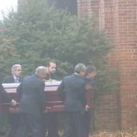 <p>Pallbearers carry James Ferrari&#x27;s casket at his funeral on Thursday.</p>