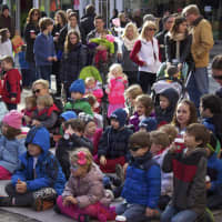 <p>Children watch a show at the Rye Chamber of Commerce Mistletoe Magic festival.</p>