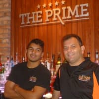 <p>The Prime&#x27;s bar features several televisions and is a few feet from the full dining area.</p>