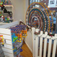 <p>A view to Main Street from inside A Nu Toy Store in Tarrytown.</p>