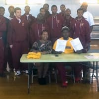 <p>New Jersey basketball star Elijah Brown signing his letter of commitment to attend Concordia College.</p>