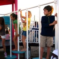 <p>Children get their first chance to play at Fairfield&#x27;s playground in September in honor of Sandy Hook victim Jessica Rekos.	</p>
