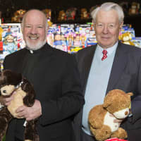 <p>Monsignor Kevin Sullivan and Empire City Casino President Timothy J. Rooney. </p>