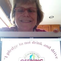 <p>Alice Joselow of Ossining Communities That Care is having people take selfies where they pledge to not drink and drive this holiday season.</p>