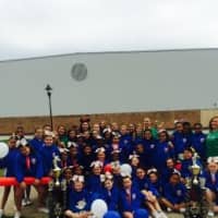 <p>Two Norwalk cheerleading teams celebrate after winning championships last weekend in Orlando, Fla.</p>